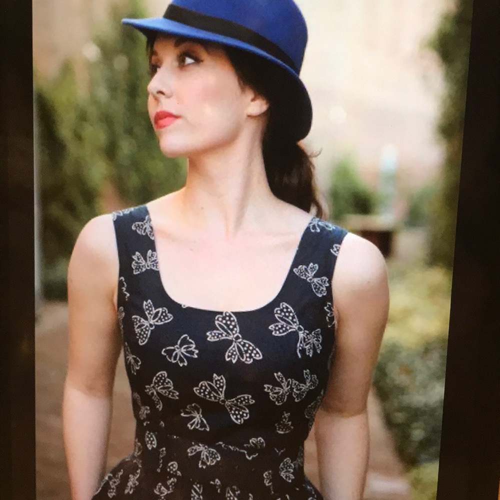Navy belted dress with bow-print